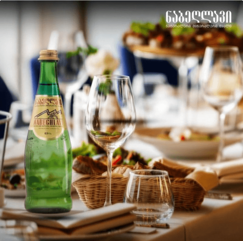 Glass bottle in premium dining setting