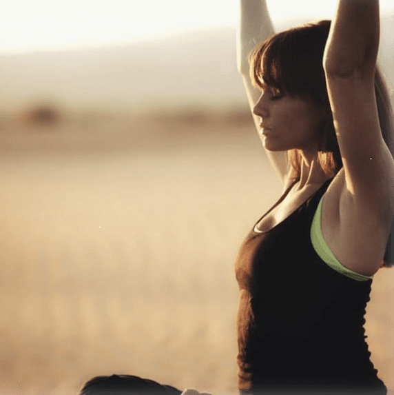 Woman in yoga/fitness pose